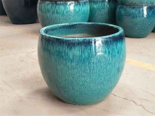 Pot extérieur en céramique bleu vitré rond de plante verte de fleur