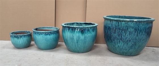 Pots en céramique ronds d'usine extérieurs